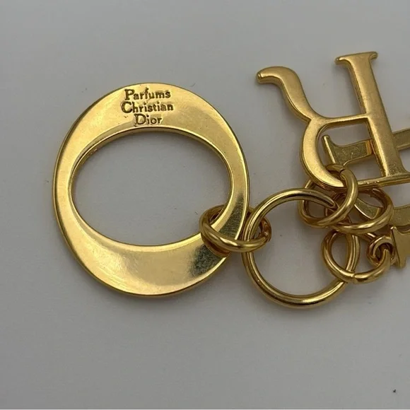 DIOR LOGO Keychain Handbag
Charm Gold Tone Metal 
Christian Dior Beauty - Picture 3 of 5